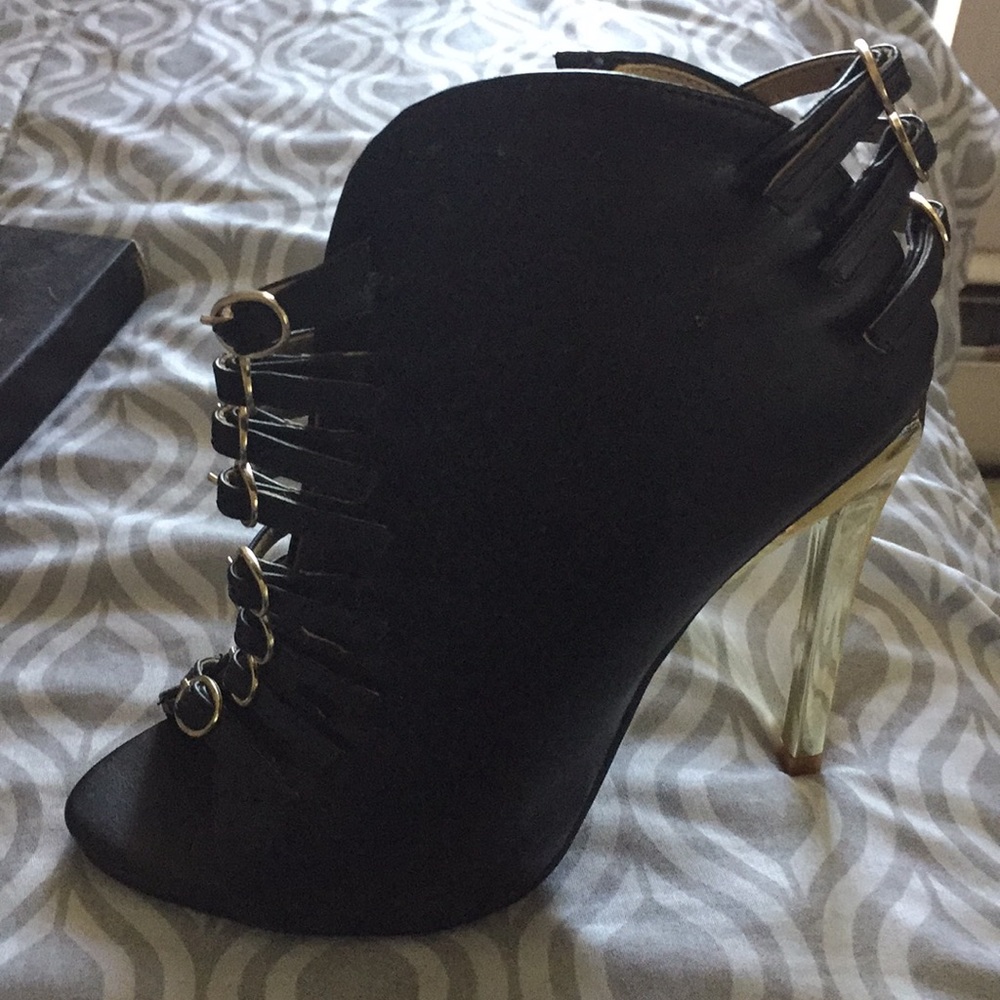 Some 7 and a half black and gold L&k shoes